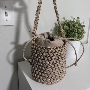 Gold chain bucket bag